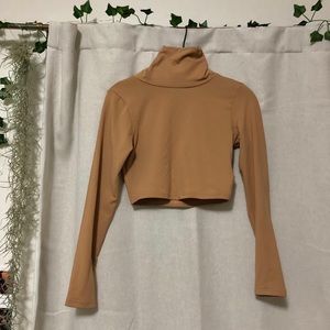 Brand new tan slightly cropped turtle neck:)